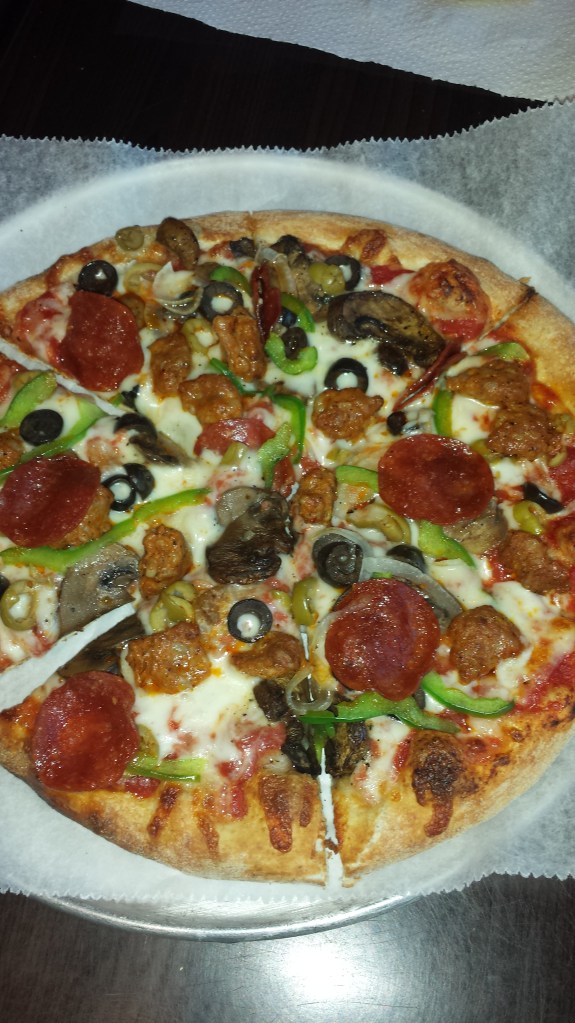 Yummy pizza pie! The veggies are for Mommy.